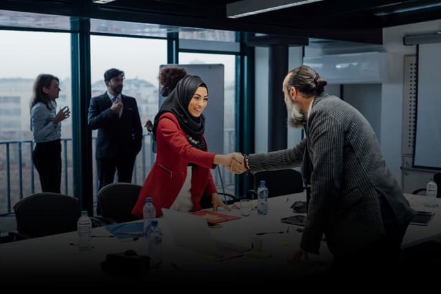 Tech Marketing Track: Woman presenting marketing strategy on screen with arrow and numbers